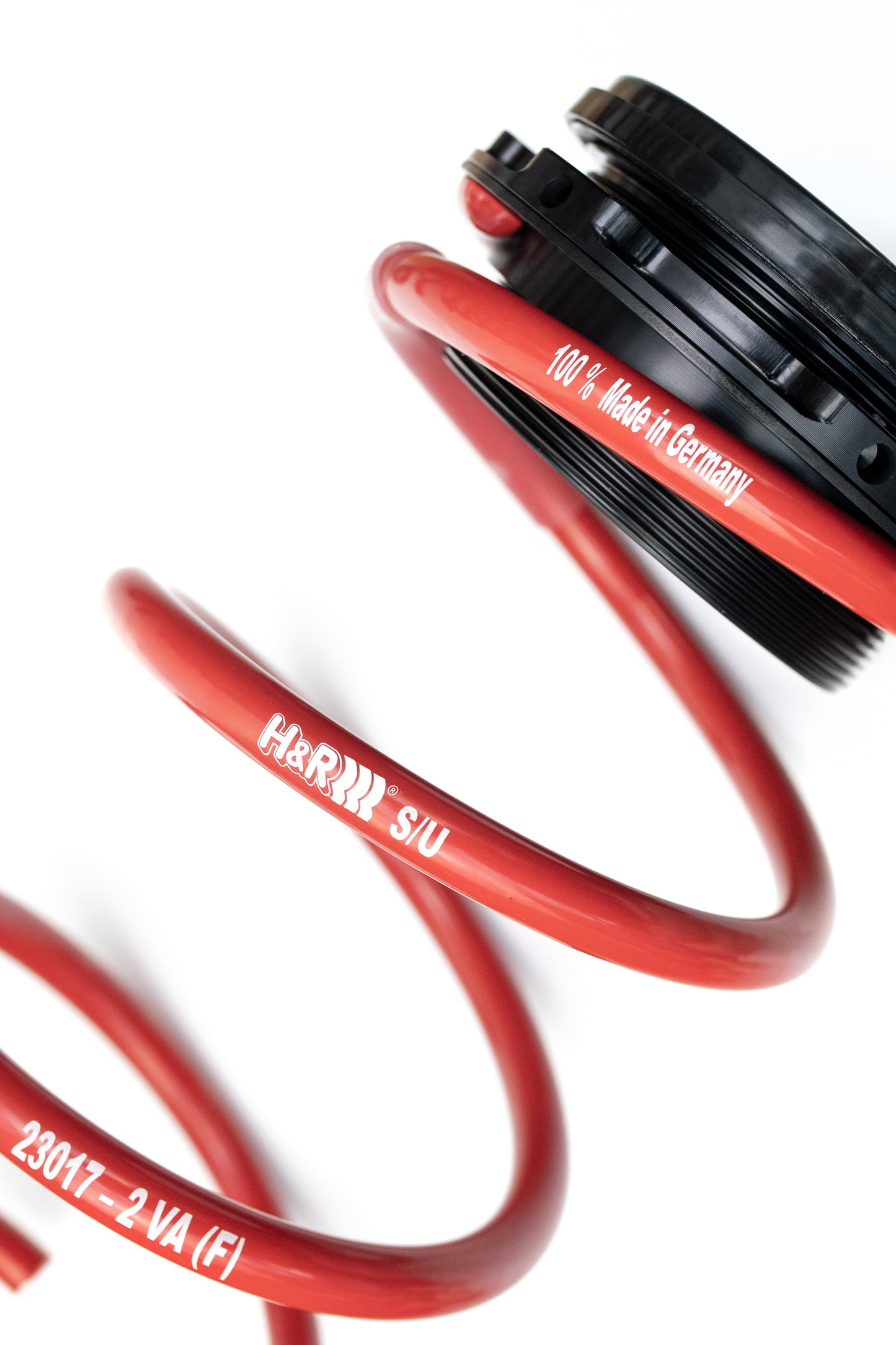 
                  
                    Eine rote Gewindefeder der Marke H&R Spezialfedern, mit eingravierte, H&R Logo, passend für Porsche 911
                  
                