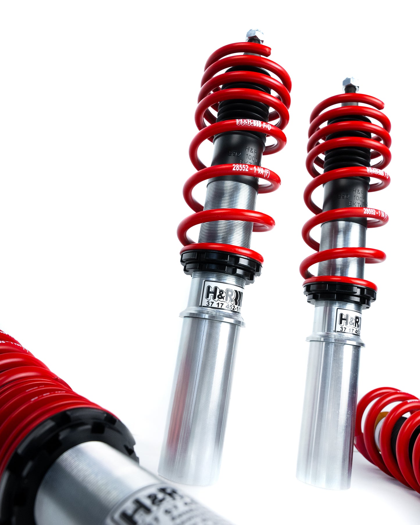 
                  
                    zwei stehende, rot-silberne Gewindefahrwerke der Marke H&R Spezialfedern, passend für Porsche 911
                  
                
